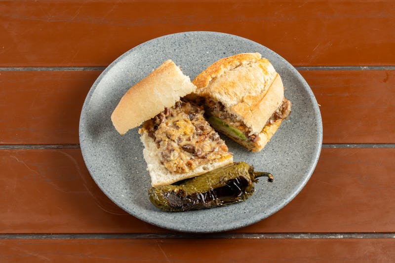 Philly Cheesesteak sandwich with sauteed peppers and onions
