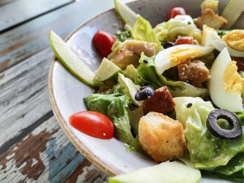 Dions Caesar salad with house-made dressing and croutons