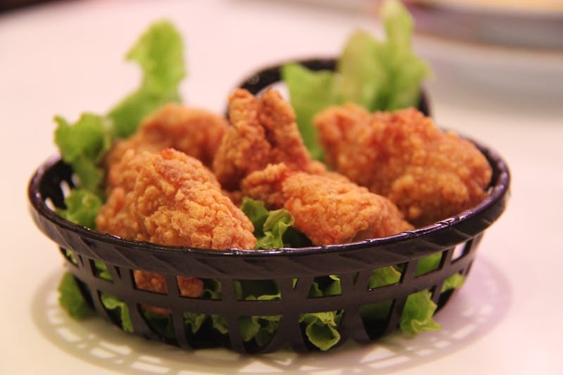 Crispy seasoned waffle fries at Dions