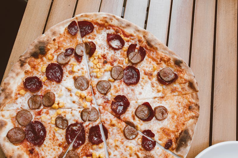 Meat Lovers dions pizza stacked with five meats